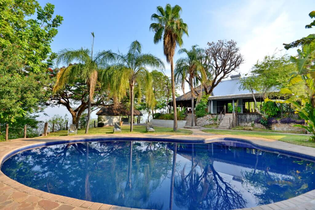 Clean swimming pool at Crowned Eagle Boutique hotel with a view of Lake Kariba perfect location for a Zimbabwe tour