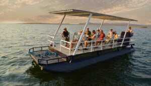Tourists riding back to the cruiseboat after an afternoon of Lake Kariba activities
